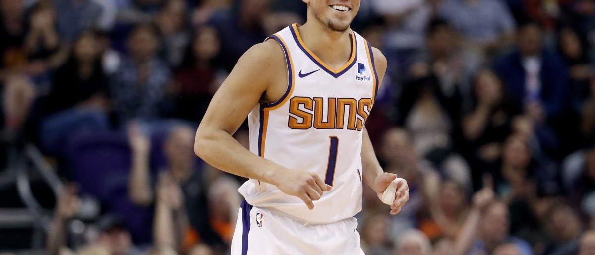 Booker anota 41 puntos y Suns derrotan 107-96 a Knicks 1